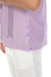 A close-up of a lilac and white striped Men’s Two-Pocket Guayabera Shirt, showing the micro-textured panel.
