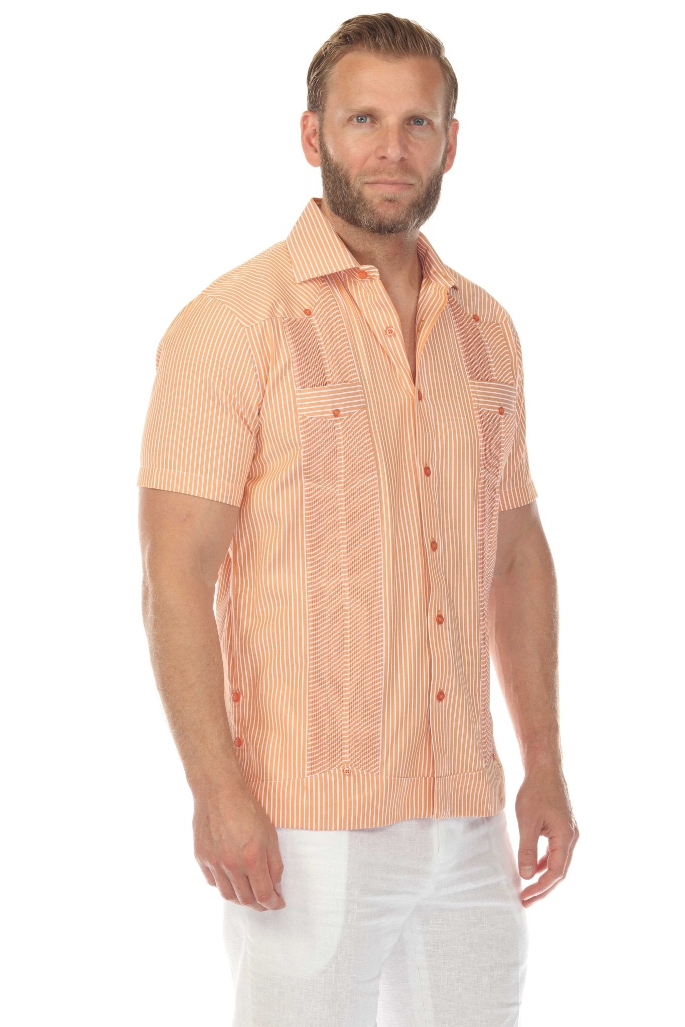 Man wearing an orange and white striped Men’s Two-Pocket Guayabera Shirt with Micro Textured Print.