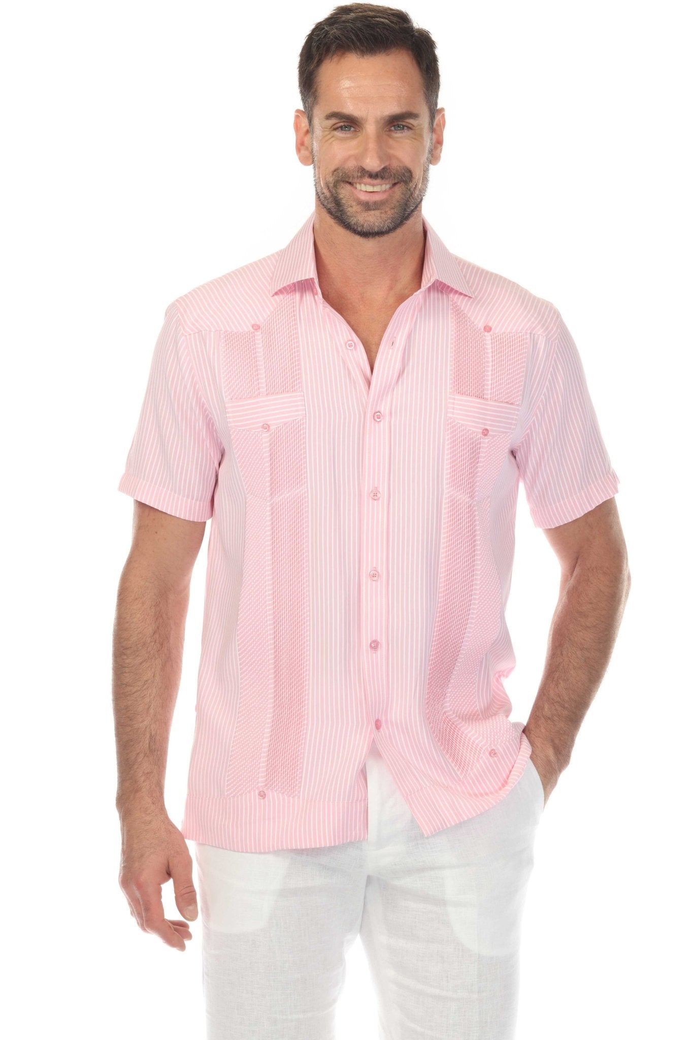 Front view of a smiling model wearing a pink striped Men’s Two-Pocket Guayabera Shirt with Micro Textured Print.
