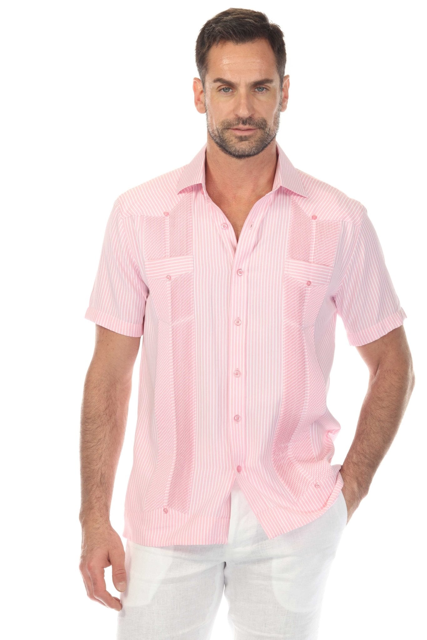 A man models a pink and white striped Men’s Two-Pocket Guayabera Shirt with Micro Textured Print.