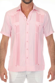 Front view of a pink and white striped Men’s Two-Pocket Guayabera Shirt with vertical micro-textured panels.