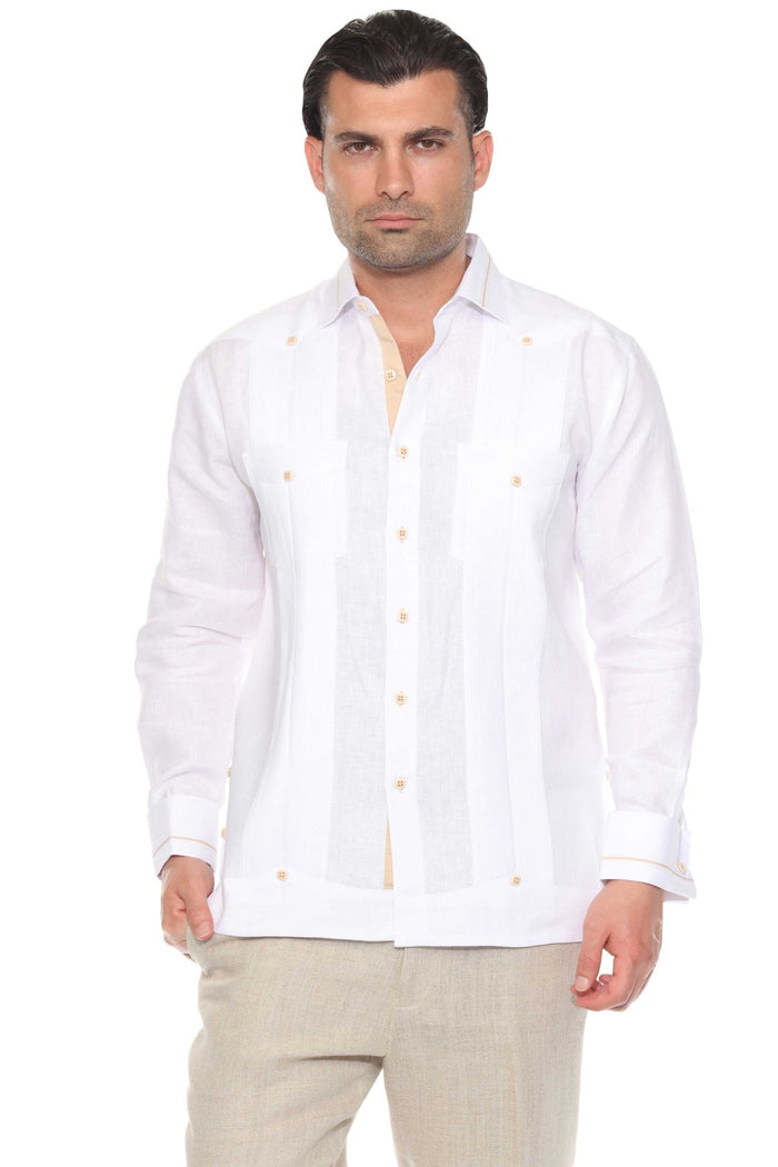 A man stands in a white Contrast Trim Linen Guayabera, showcasing the two pockets and long sleeves.