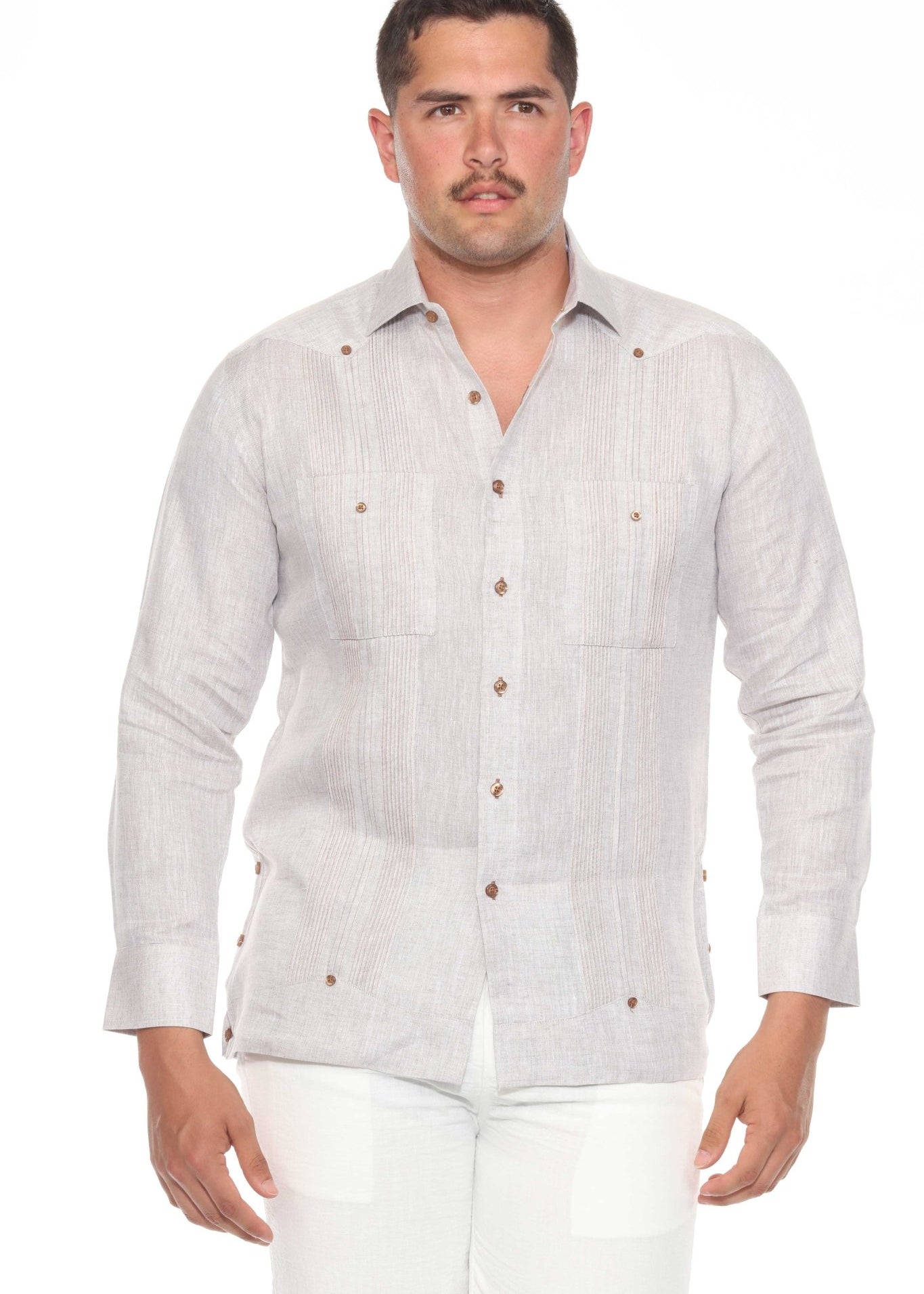Front view of a man wearing a grey linen Men’s 100% Linen Guayabera Shirt with long sleeves.