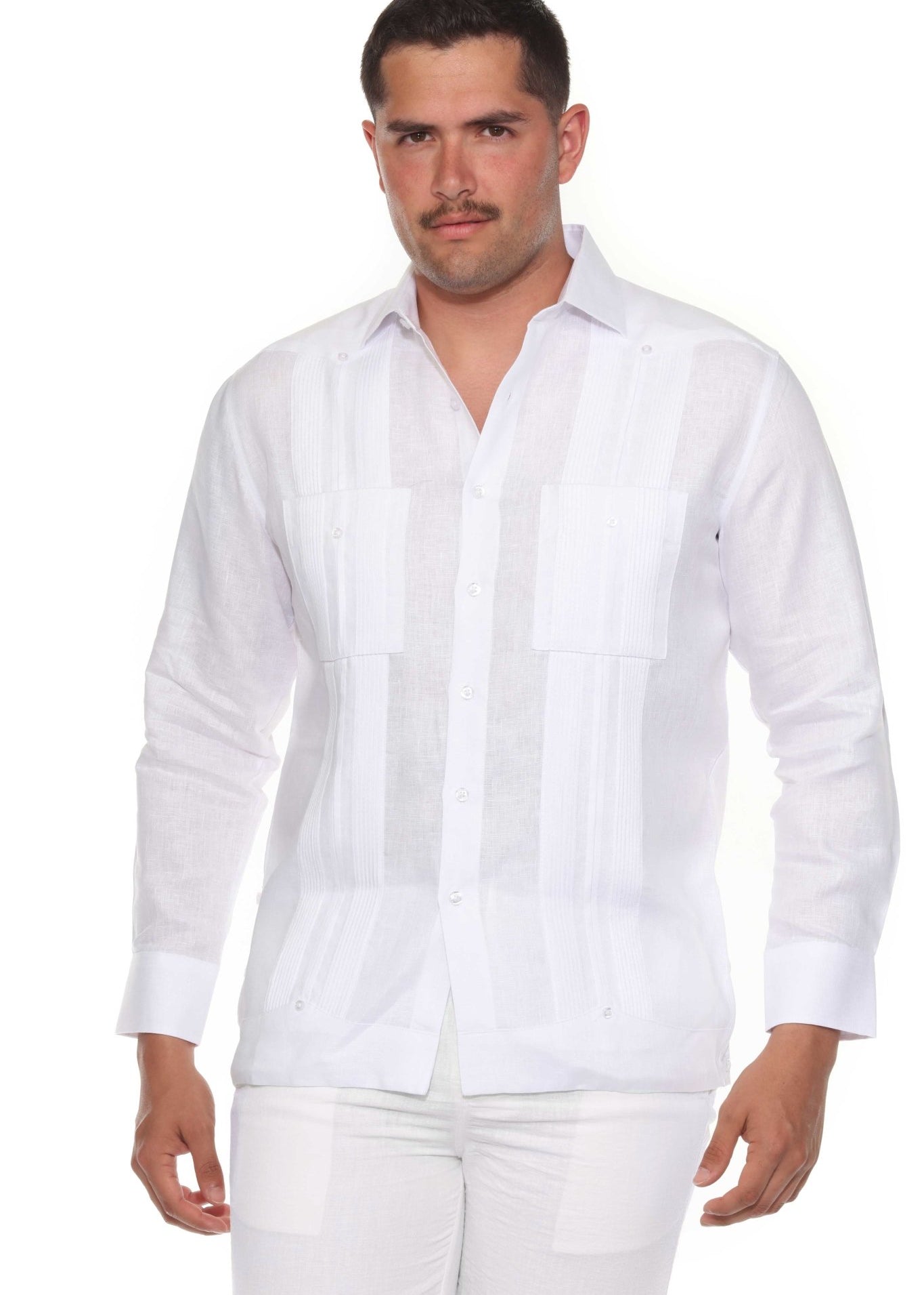 Front view of a man wearing the white Men’s 100% Linen Guayabera Shirt featuring long sleeves and heritage pleats.