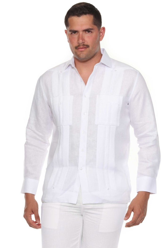 A man wears an off-white long-sleeve Men’s 100% Linen Guayabera Shirt with heritage pleats.