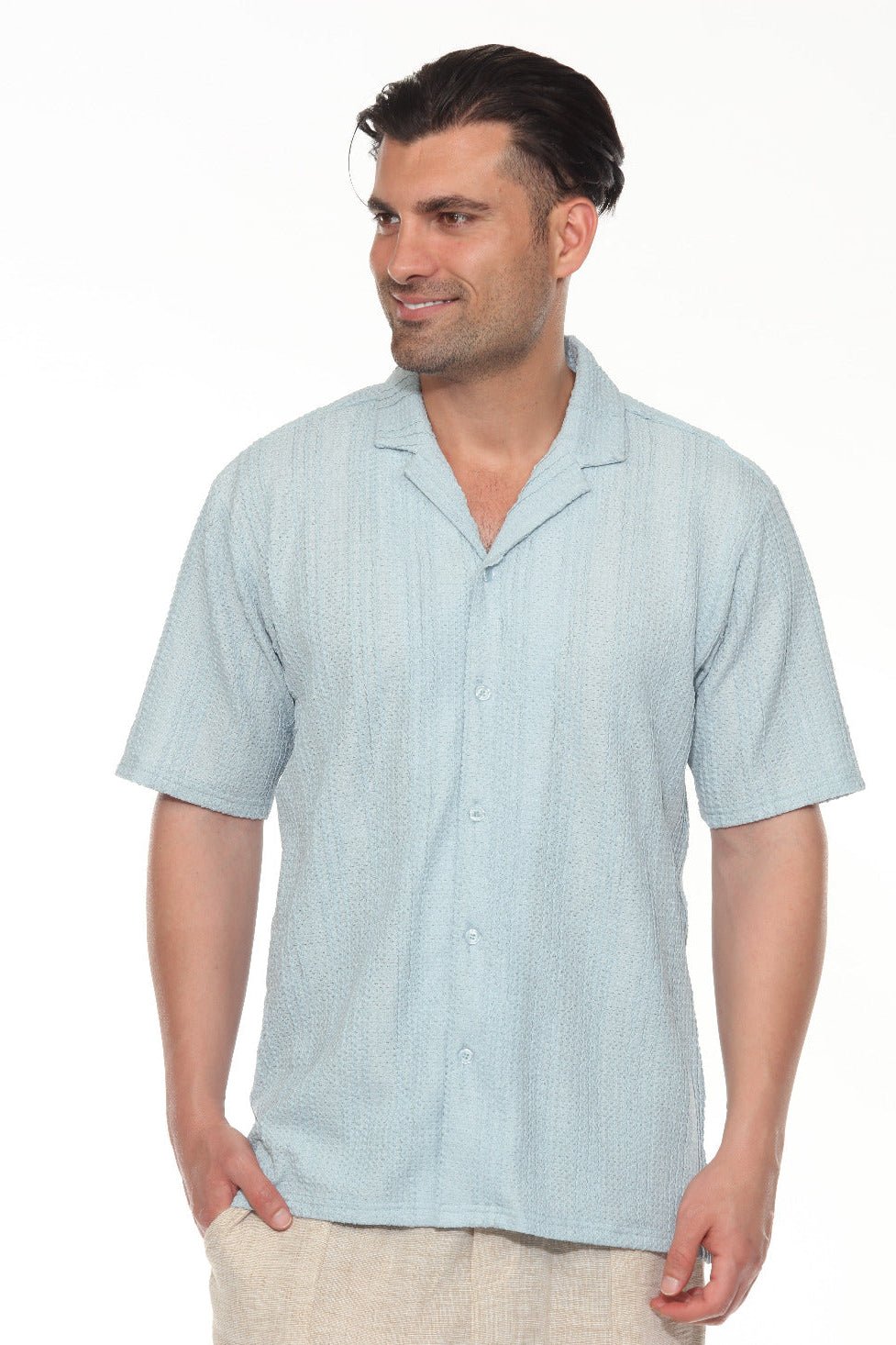 Polo elegante de primera calidad para hombre con moderno patrón de punto trenzado texturizado