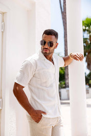Polo elegante de primera calidad para hombre con moderno patrón de punto trenzado texturizado