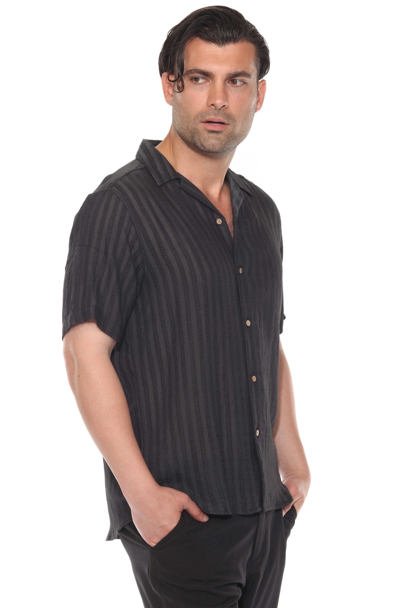 Man wears the dark striped Rayon Blend resort shirt, shown from the front.