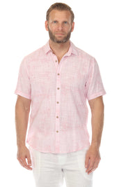 Front view of a man wearing the pink Men’s Cross Hatch Short Sleeve Button Down Resort Shirt.