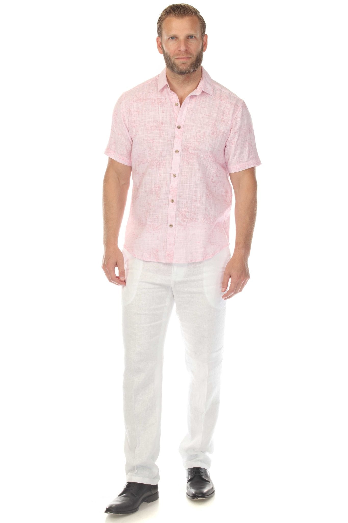 Front view of a man wearing the Men’s Cross Hatch Short Sleeve Button Down Resort Shirt in light pink with white trousers.