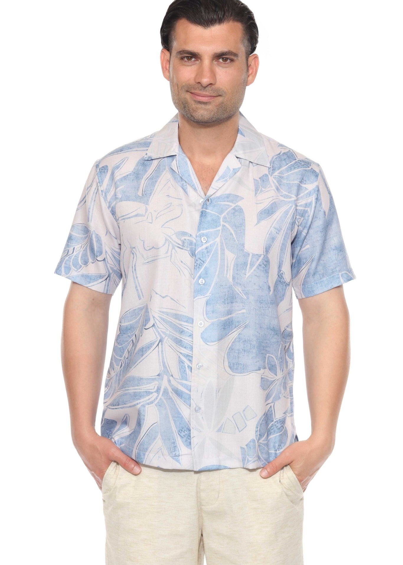 Front view of a man wearing the Men's Tropical Print Resort Shirt, featuring a light blue tropical leaf pattern.