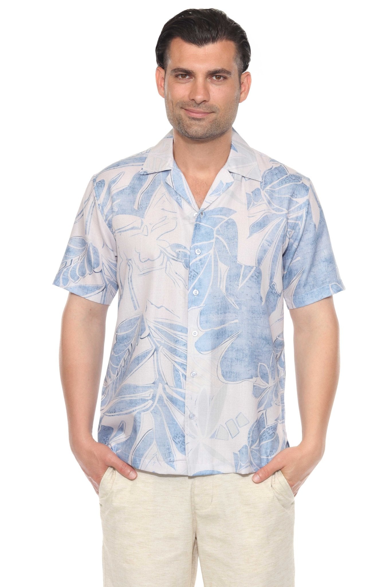 Front view of a man wearing the Men's Tropical Print Resort Shirt, featuring a light blue tropical leaf pattern.