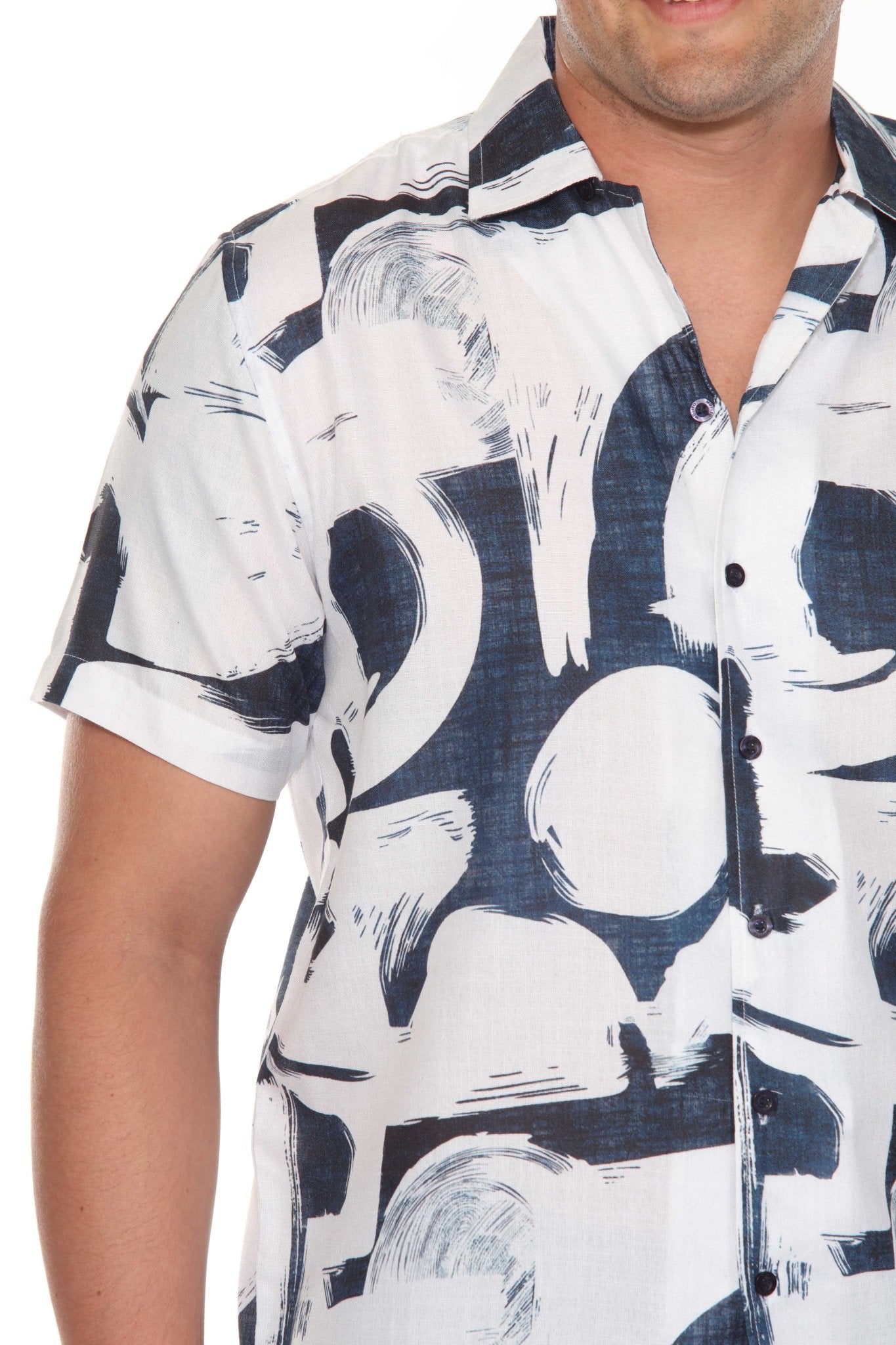 Cropped view of a Men’s Tropical Print Resort Shirt with short sleeves and a white and navy print.