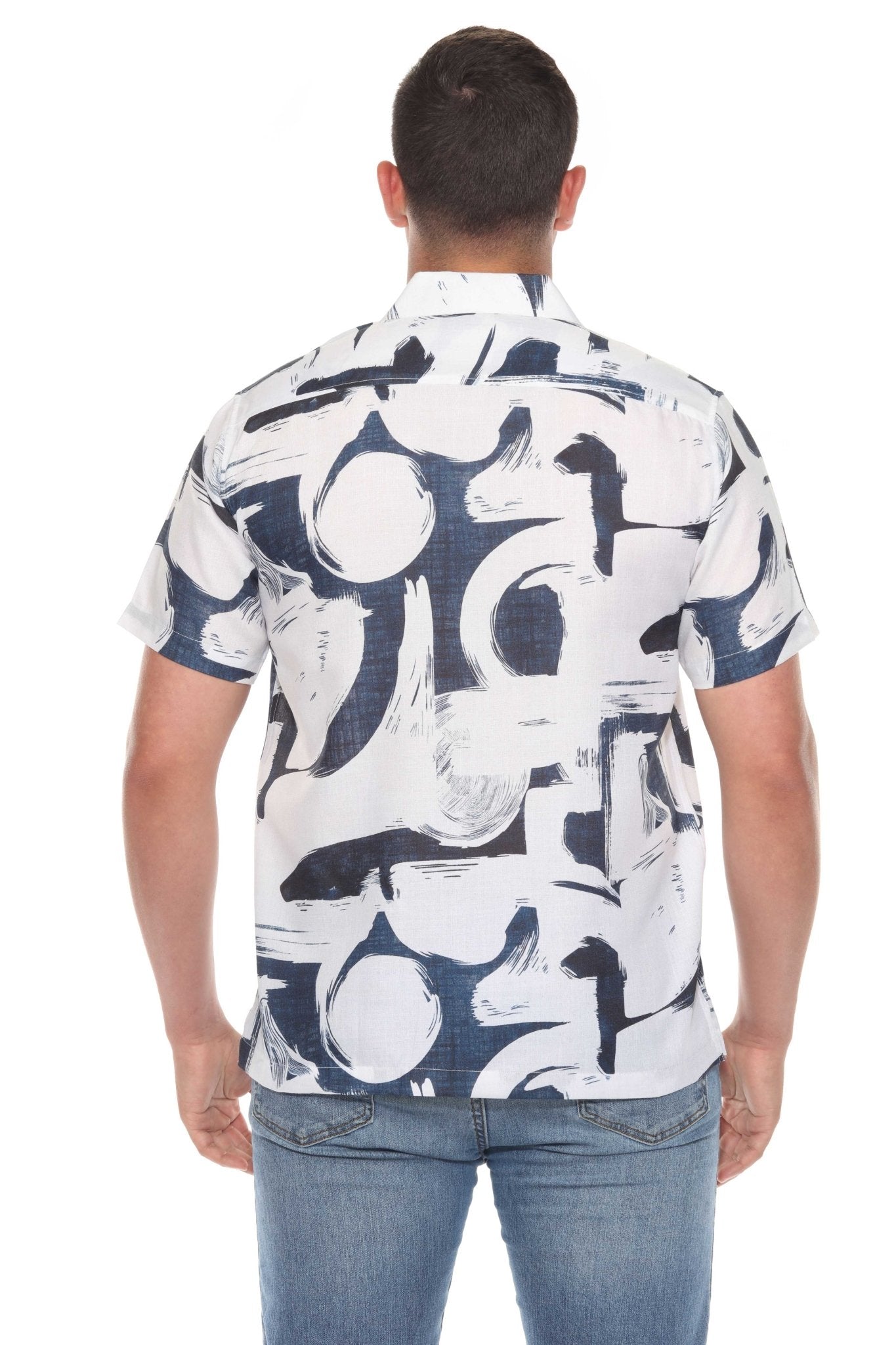 Back view of a person wearing the Men’s Tropical Print Resort Shirt, which is white with a blue patterned print.
