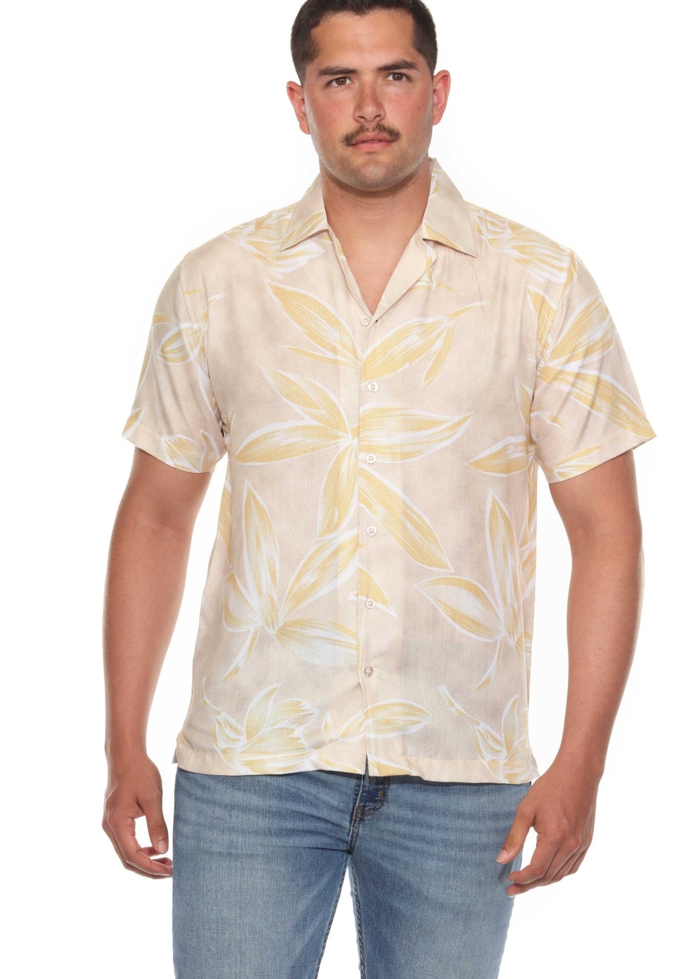 Front view of a man wearing the Men’s Tropical Print Resort Shirt, a short sleeved button-up with a beige and yellow leaf pattern.