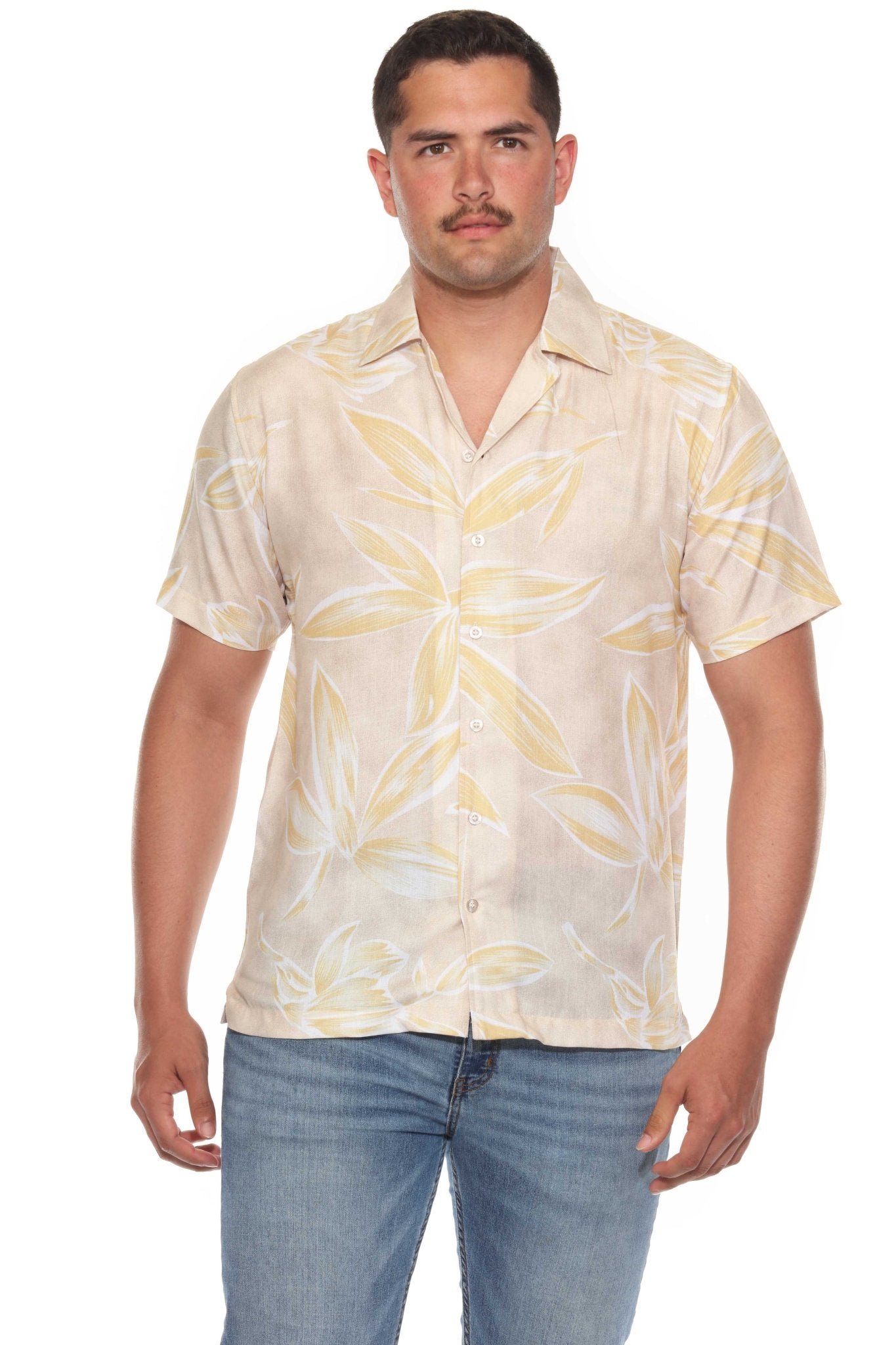 Front view of a man wearing the Men’s Tropical Print Resort Shirt, a short sleeved button-up with a beige and yellow leaf pattern.