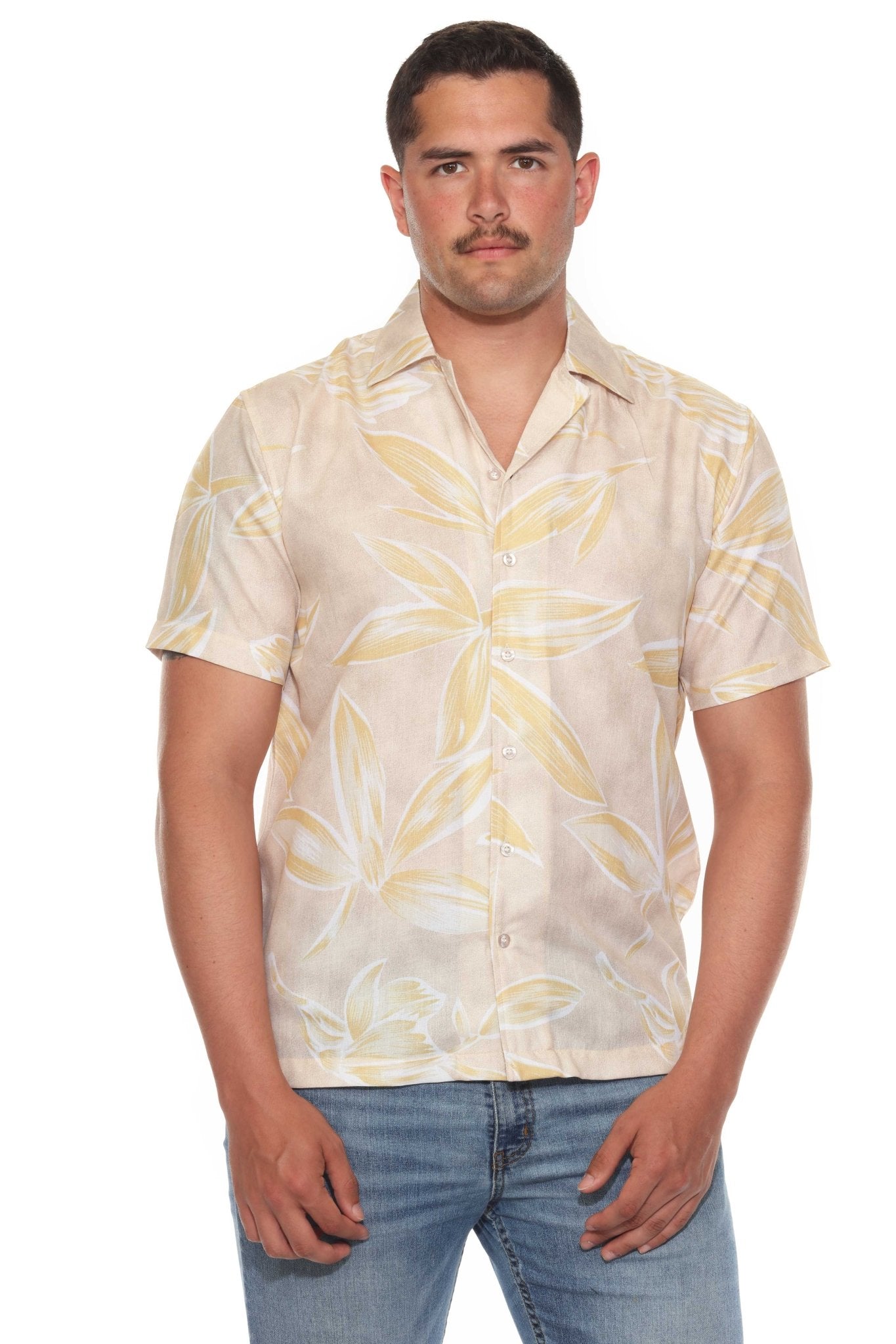 Front view of a person wearing the Men’s Tropical Print Resort Shirt, which is light beige with large yellow leaf patterns.