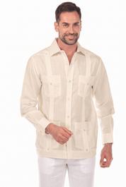 Front view of a man wearing a natural beige, long-sleeve Irish Linen Four Pocket Guayabera Shirt.