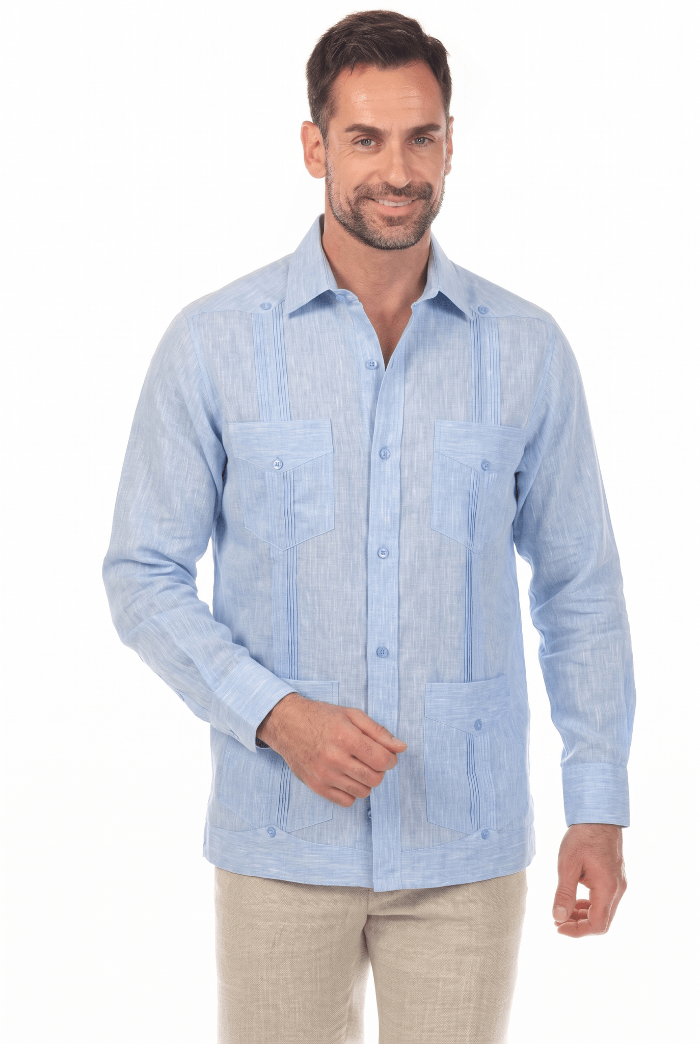Front view of a man wearing a light blue, long-sleeve Irish Linen Four Pocket Guayabera Shirt.