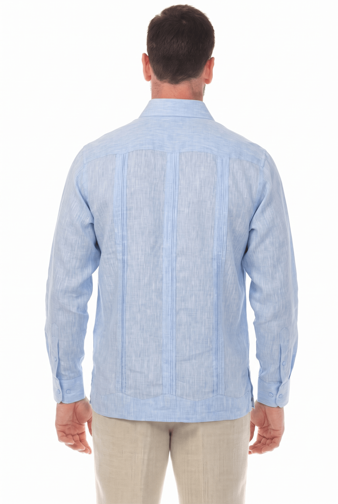 Back view of a man wearing a long-sleeve, light blue Irish Linen Four Pocket Guayabera Shirt.