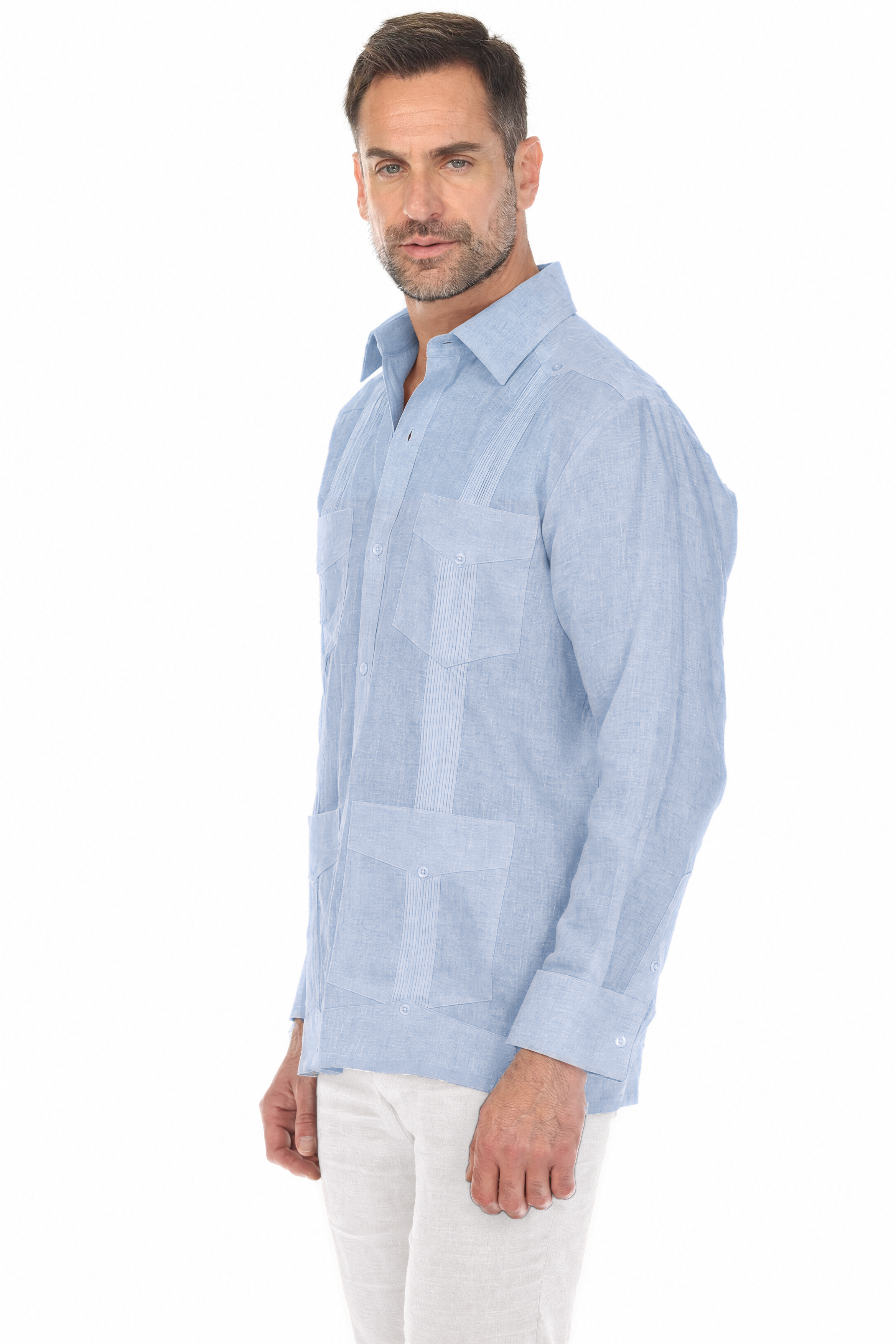 Side angle of a man wearing the light blue Irish Linen Four Pocket Guayabera Shirt.