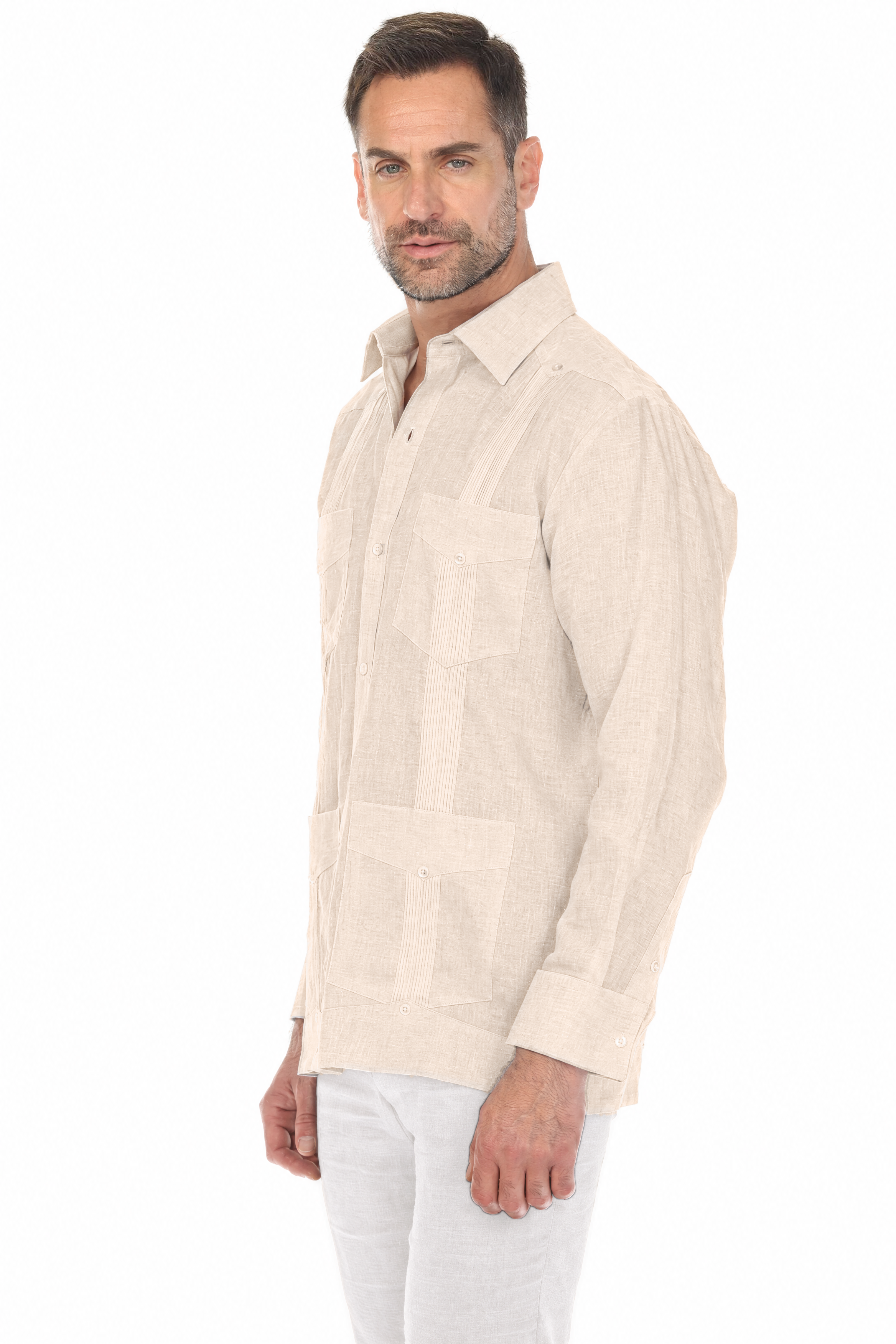 Side angle of a man wearing the natural Irish Linen Four Pocket Guayabera Shirt.