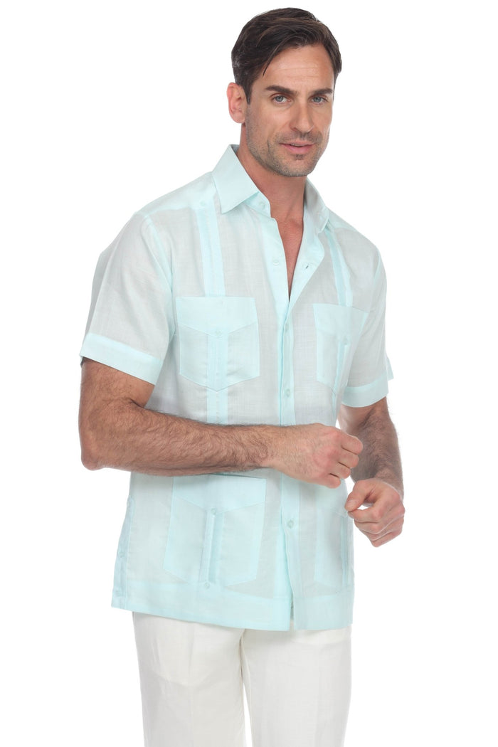 Front view of a men's white short sleeve linen guayabera shirt with subtle embroidery and functional pockets.