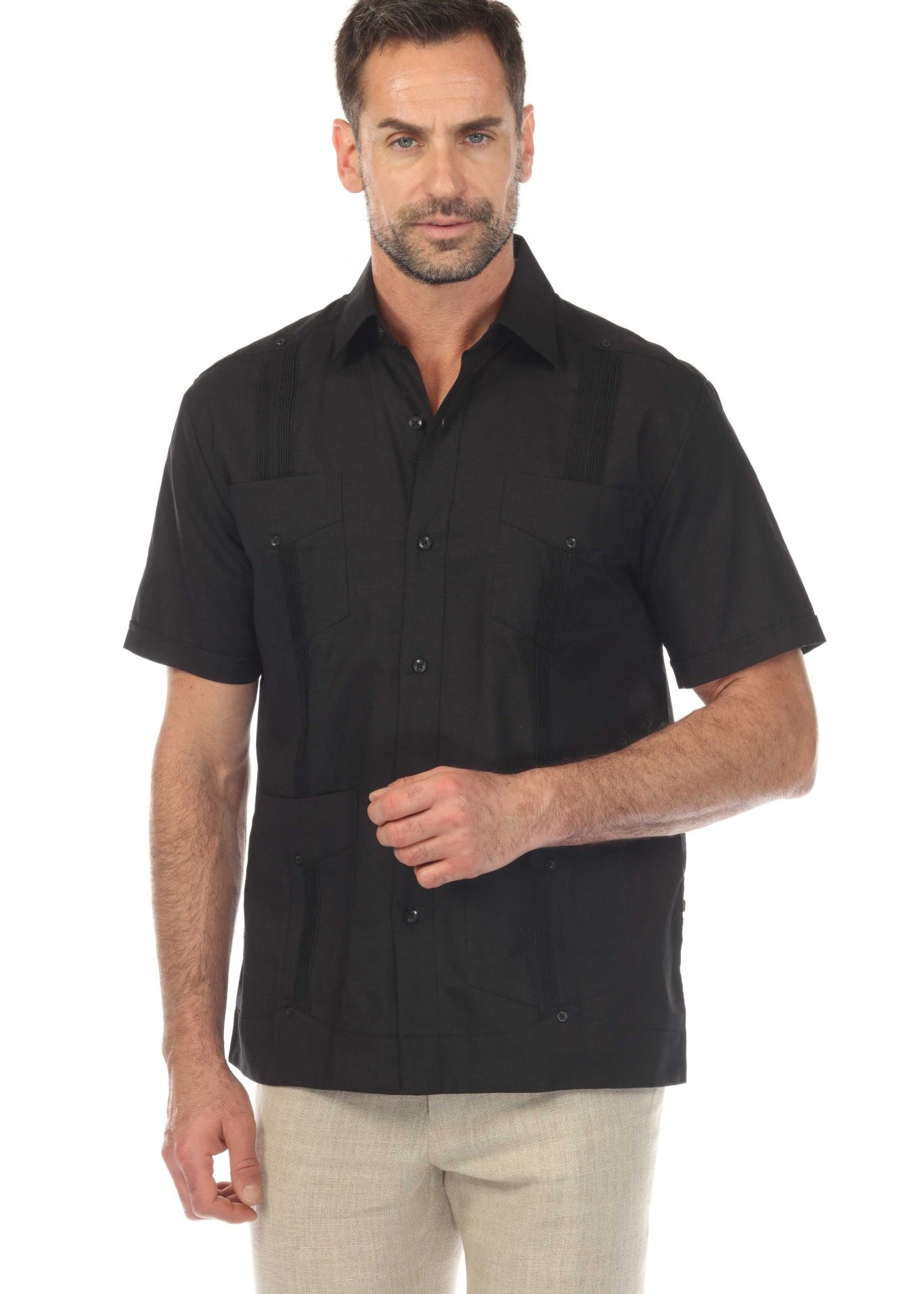 Front view of a black short sleeve guayabera shirt made from premium breathable linen with authentic embroidery and a tailored-relaxed fit.