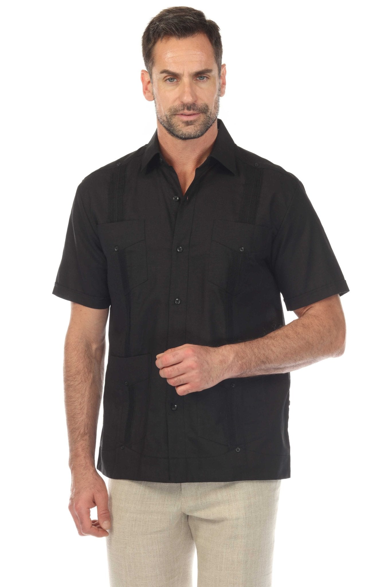 A man wears a black Men’s Big & Tall 100% Linen Classic Short Sleeve Guayabera Shirt, front view.