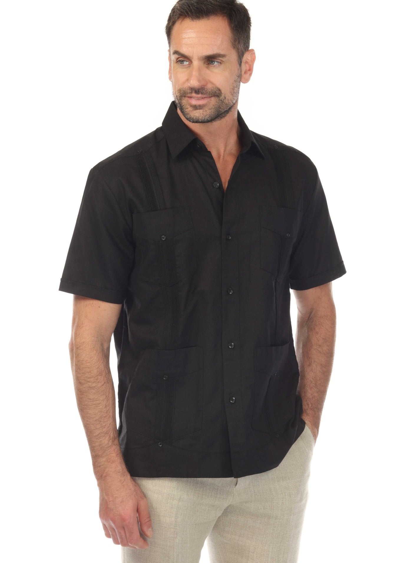 Men's 100% linen guayabera shirt in black featuring traditional four-pocket styling and vertical pleats for a modern resort look.