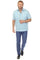A man wearing the light blue Men’s Big & Tall 100% Linen Classic Short Sleeve Guayabera Shirt.