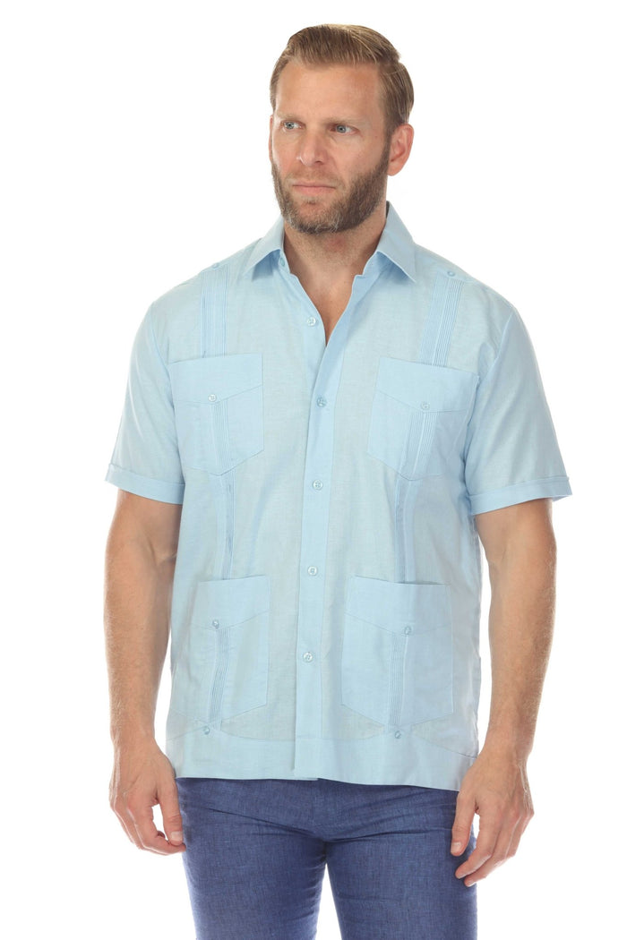 Men's 100% linen guayabera shirt in black featuring traditional four-pocket styling and vertical pleats for a modern resort look.