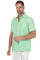 Three-quarter view of the mint green short sleeve linen guayabera shirt showing the collar, pleats and flap pockets.