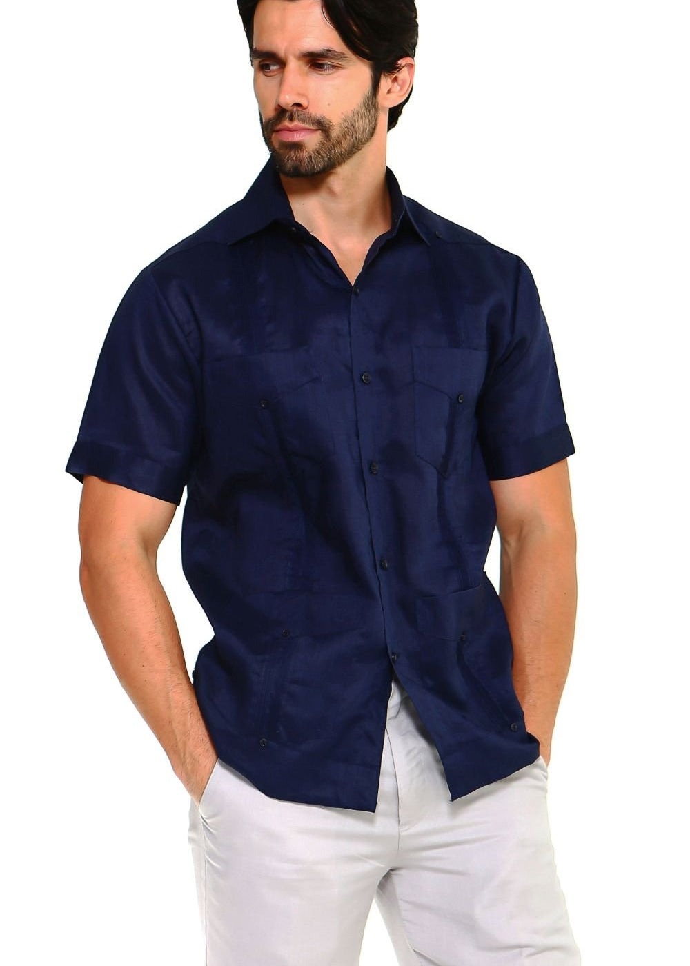Three-quarter front view of the men's navy blue short sleeve linen guayabera shirt with four pockets.