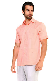 Men’s peach-toned linen guayabera shirt, perfect for beach weddings, summer dinners, and special occasions.