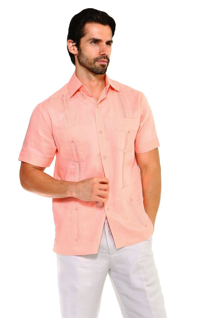 Men's 100% linen guayabera shirt in black featuring traditional four-pocket styling and vertical pleats for a modern resort look.