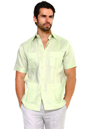 Men's linen short sleeve guayabera shirt in lime green with traditional vertical pleats and four pockets.