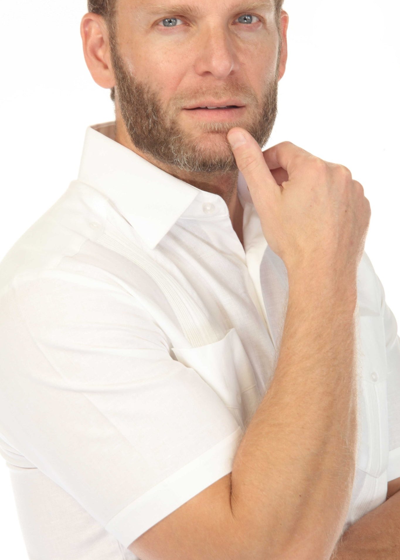 A man in a white Men's Big & Tall 100% Linen Classic Short Sleeve Guayabera Shirt.