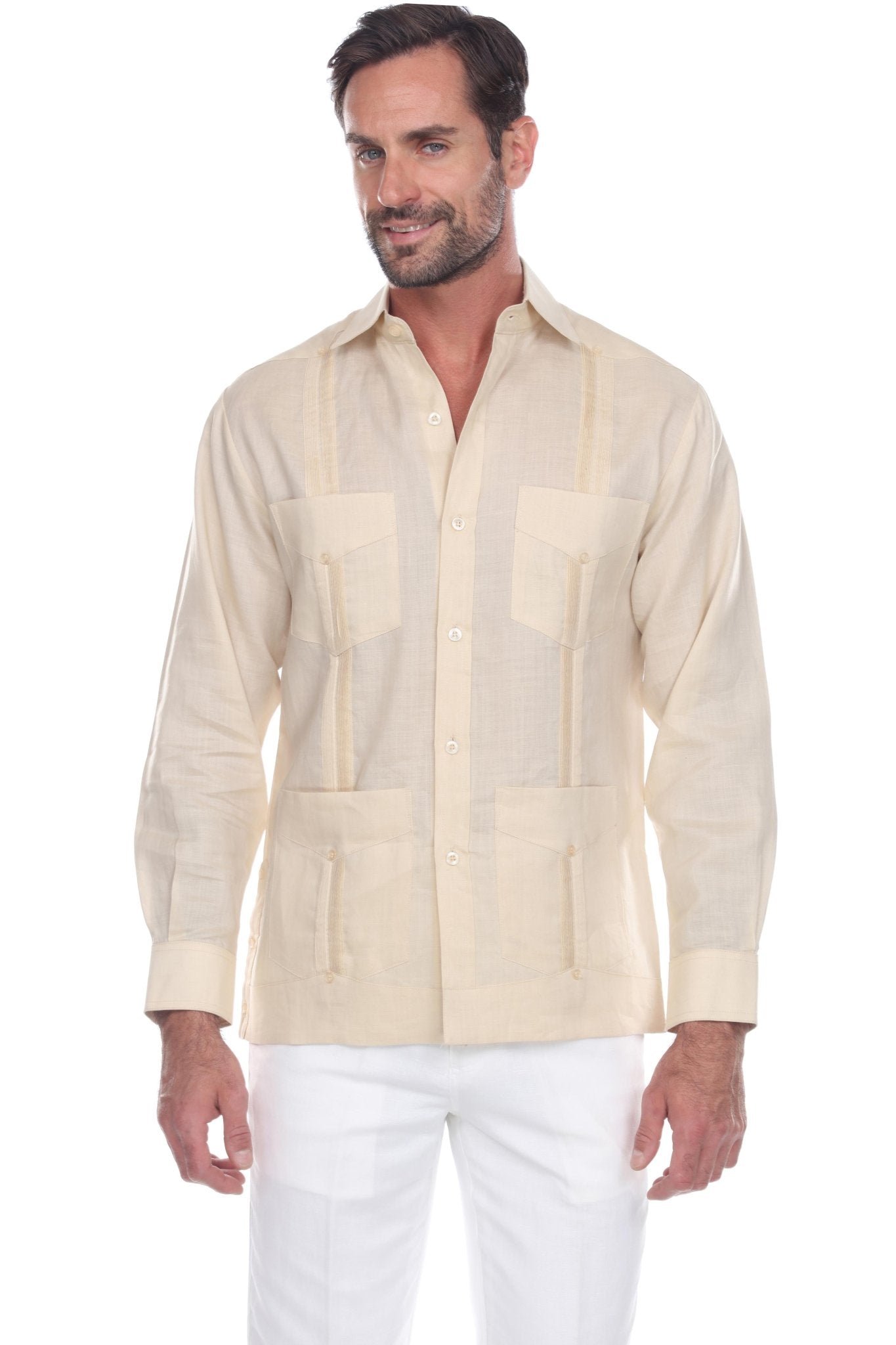 Front view of a man wearing a light beige, long-sleeve, 4-pocket Men’s Big & Tall Guayabera Shirt.