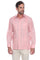 Front view of a man wearing a pink linen Men's Classic Four-Pocket Long Sleeve Guayabera Shirt.