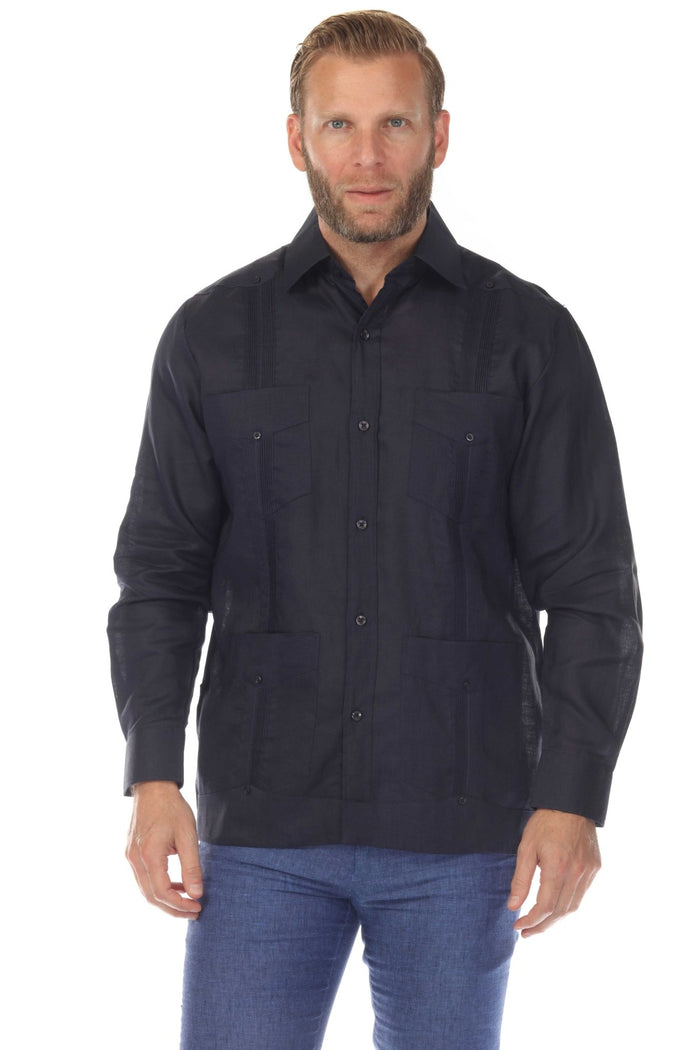 Front view of a man wearing a light beige long-sleeve 4-pocket Men’s Big &amp; Tall Guayabera Shirt.
