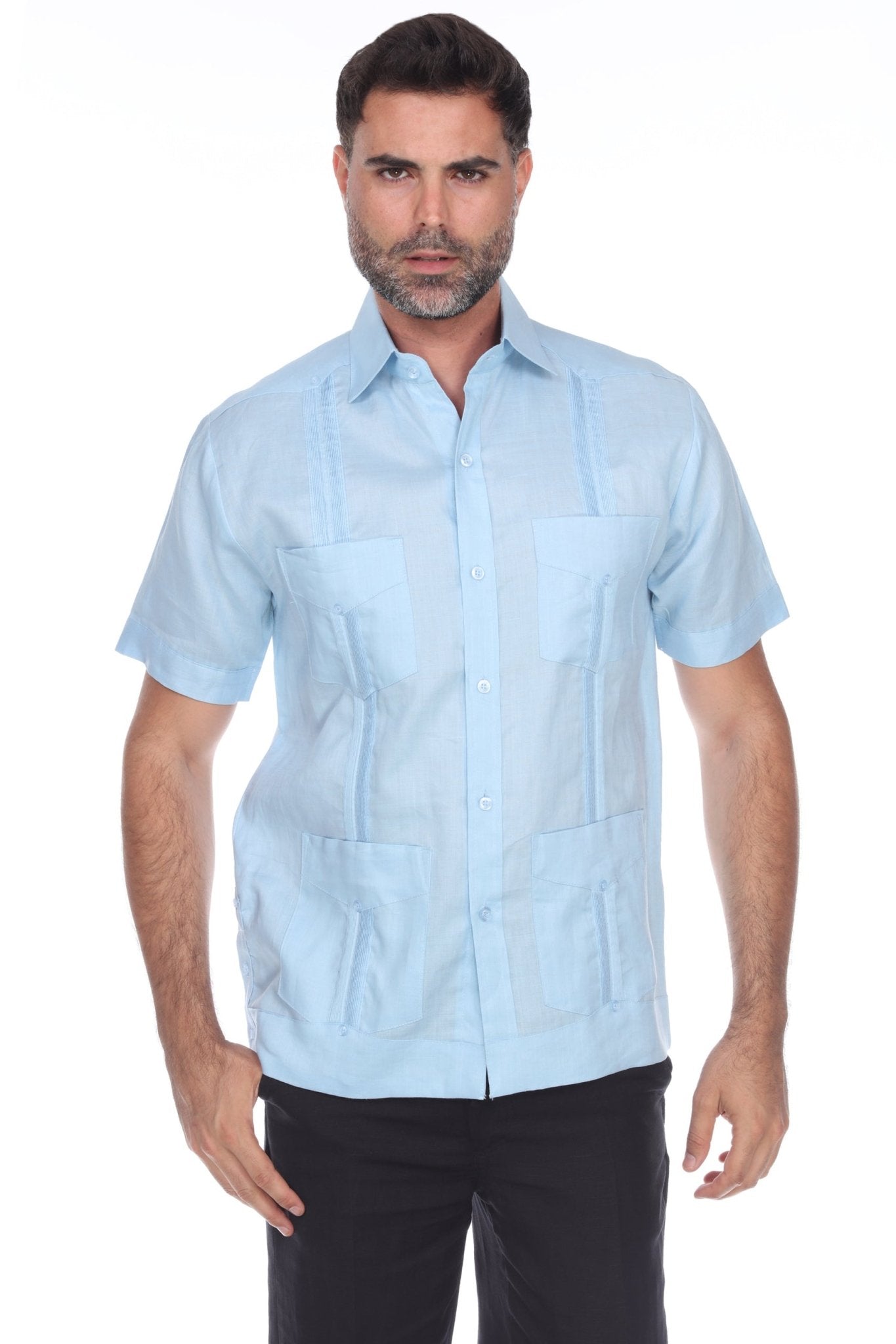 Men’s light blue short sleeve guayabera shirt featuring a traditional 4-pocket layout and breathable cotton-blend fabric.
