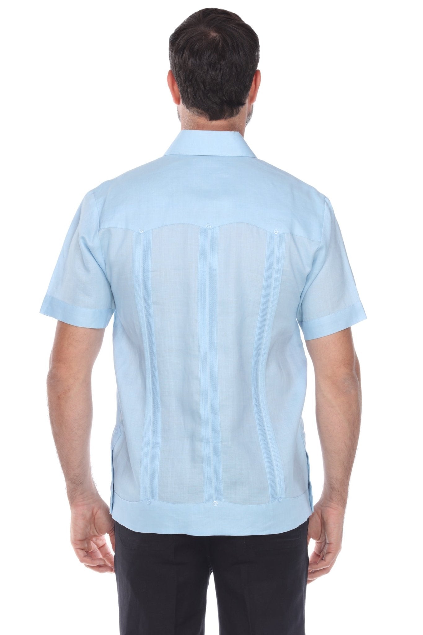Men’s light blue short sleeve guayabera shirt featuring a traditional 4-pocket layout and breathable cotton-blend fabric.