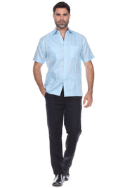 Men’s light blue short sleeve guayabera shirt featuring a traditional 4-pocket layout and breathable cotton-blend fabric.