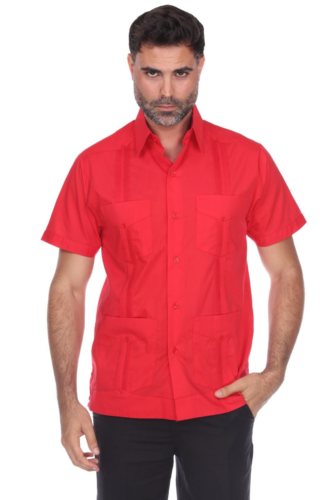 A man wearing a bright red short-sleeve button-up shirt with a collar, two chest pockets, and two large front patch pockets, paired with black pants, against a plain white background.