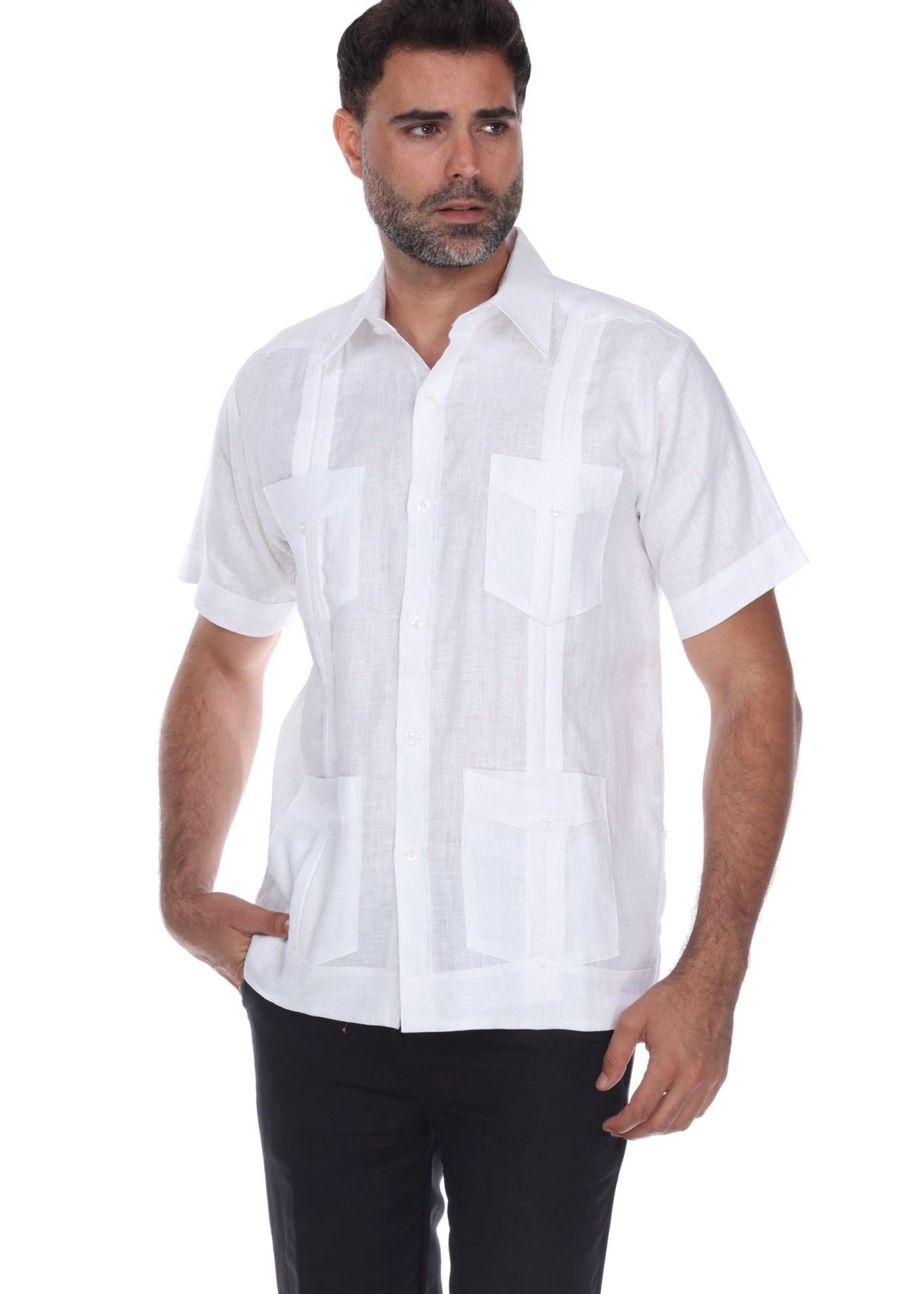 White men's short sleeve guayabera shirt featuring a traditional 4-pocket front and subtle pleats.