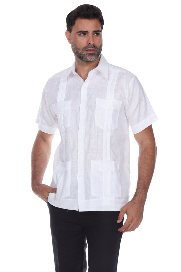 White men's short sleeve guayabera shirt featuring a traditional 4-pocket front and subtle pleats.