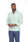A man wearing a light mint green Guayabera-style shirt with vertical stripes and blue jeans, standing against a plain white background.