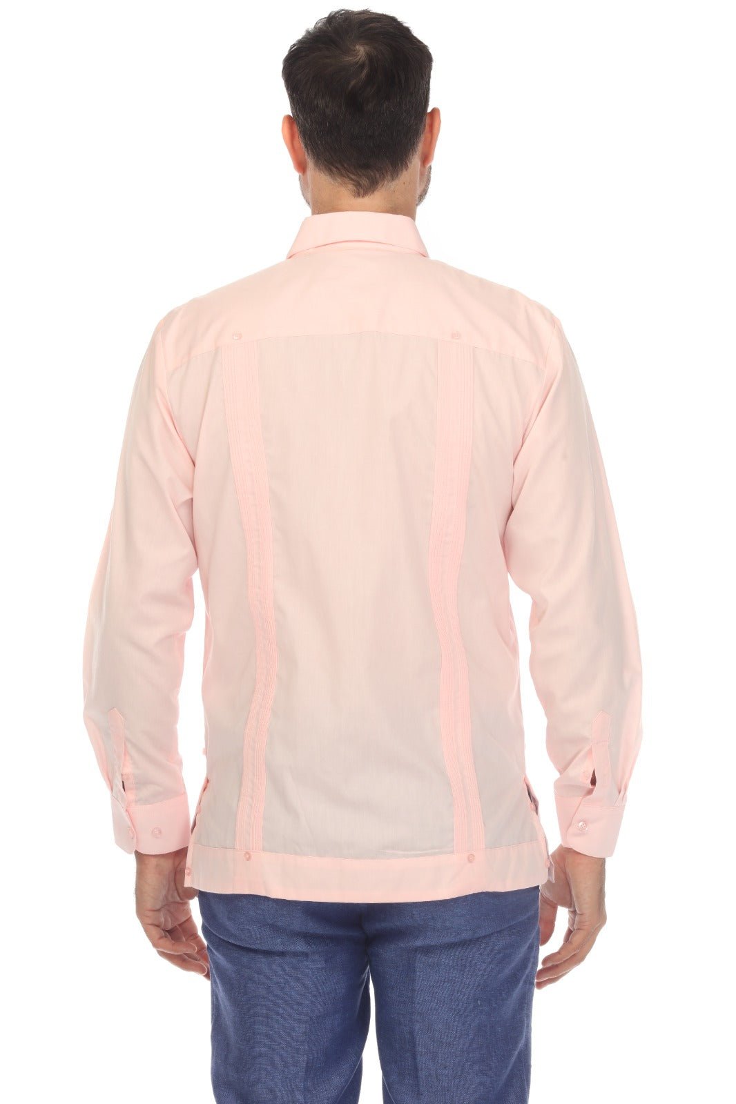 A man viewed from the back wearing a light pink long-sleeve shirt with vertical contrast stitching and blue jeans, set against a plain white background.