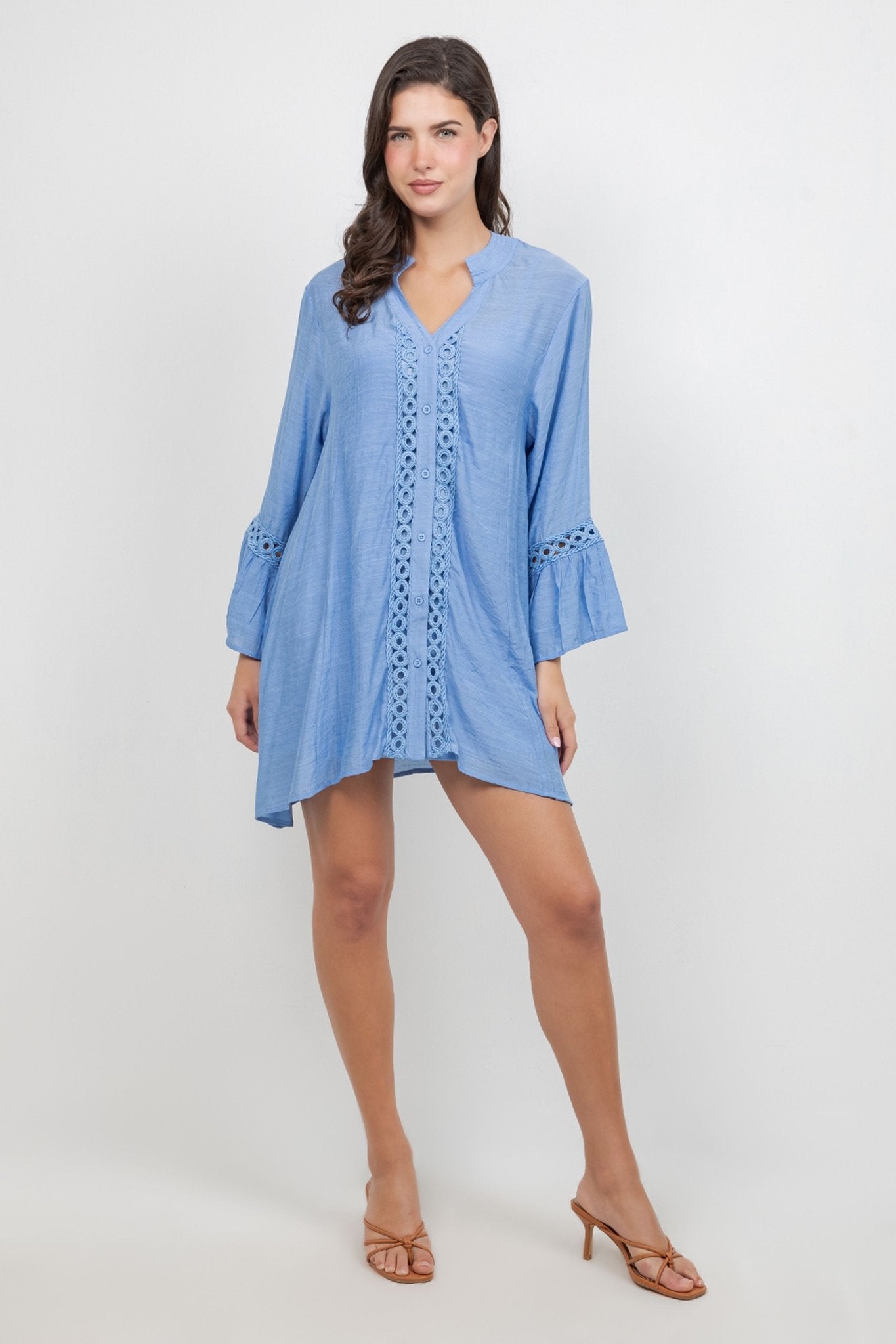 A woman models the light blue Ladies Boho Lace Trim Tunic Dress Set with lace detailing.